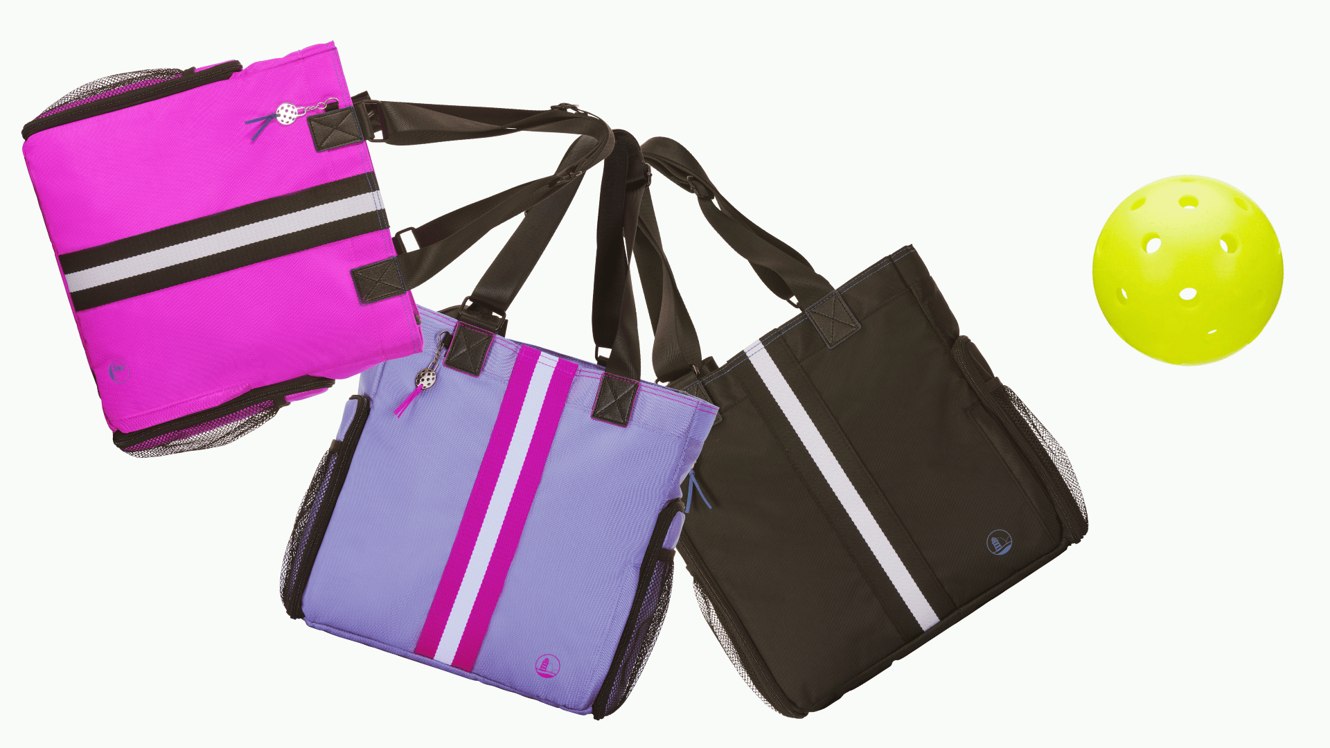 three striped women's pickleball totes swinging to hit a ball