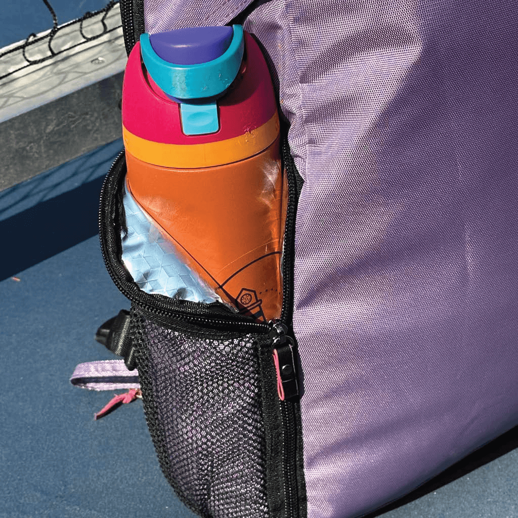 Closeup of insulated pocket on pickleball backpack for women