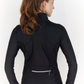 backview of women's athletic jacket with silver zipper across back