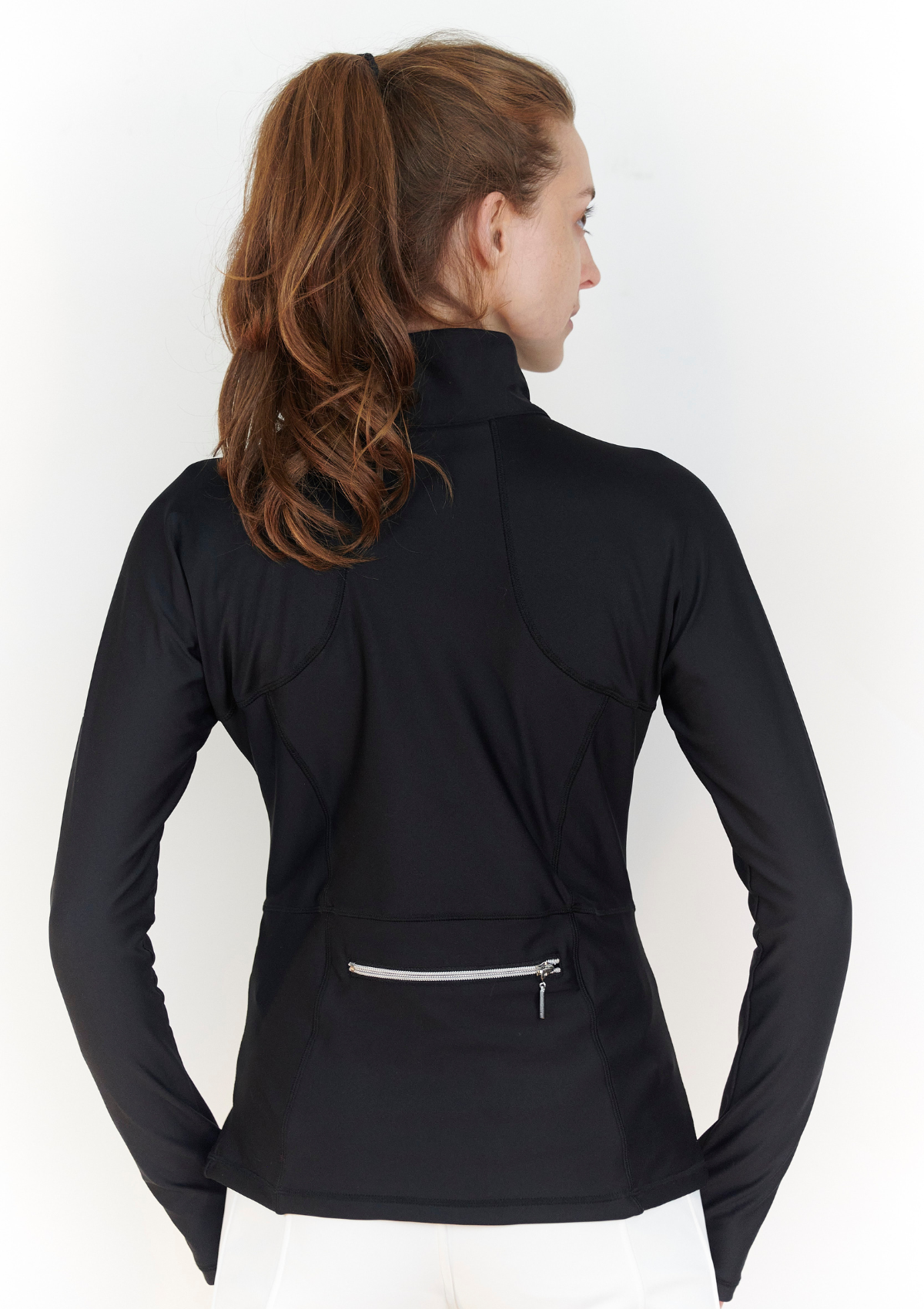 backview of women's athletic jacket with silver zipper across back