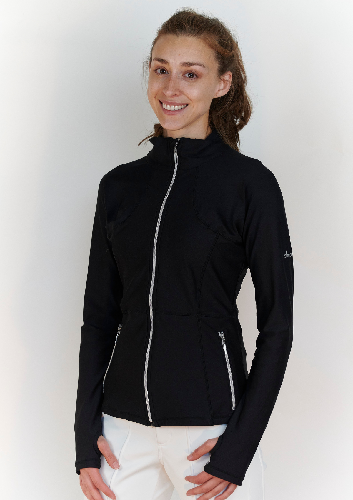 Front view of black Rosie active jacket with silver zipper-front and pockets