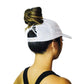 Back view of women with bun through top of VIMUE baseball cap designed specifically for women